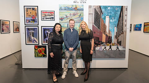Mei Fung, Grant Milne, and MaryAnn Giella McCulloh pose at One Art Space gallery