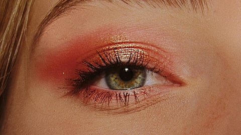 a warm-toned eye makeup look