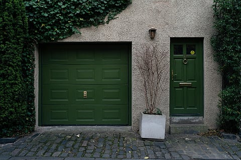 a green garage door