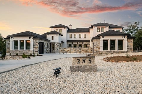 a 5-bedroom, 4-bathroom single-family home located at 285 Scenic Canyon in New Braunfels, Texas