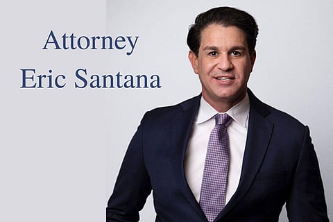 attorney dressed in a dark blue suit