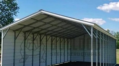 a Bulldog Steel Structures metal carport with a vertical roof design