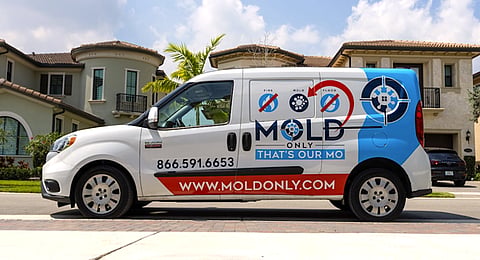 Mold Only business truck outside a luxury home
