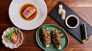 Assorted sushi, sashimi, and signature dishes from Uchi Miami's Japanese-inspired menu