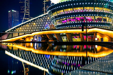 the Hangzhou Grand Theatre illuminated at night