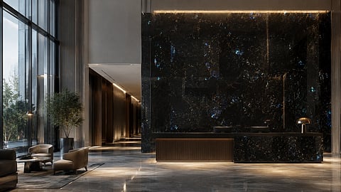 Lobby featuring floor-to-ceiling Volga Blue granite with iridescent blue accents
