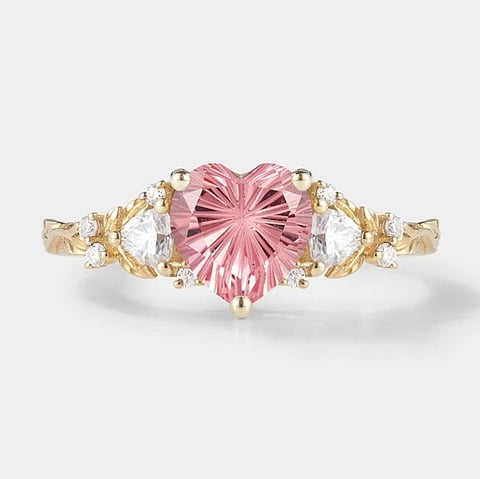 Mythical heart-shaped ring features a unique gemstone