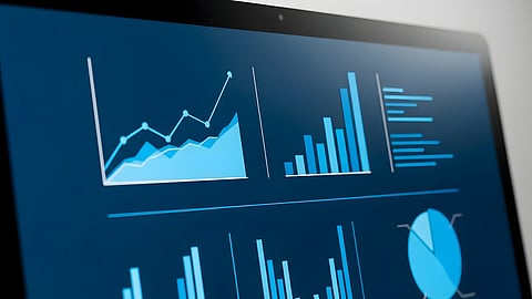 Business analytics dashboard displaying charts and performance metrics on a laptop screen