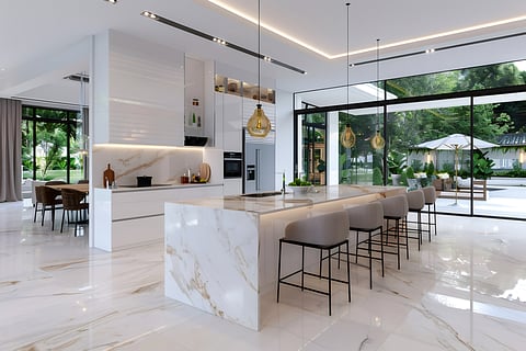 modern white and marble kitchen opening onto the garden
