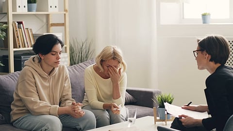 a scene of family counseling or therapy