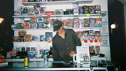 Trading card displays inside Bleecker Trading's West Village storefront