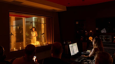 Maura Nava's records in Art House Studios as producers monitor the session