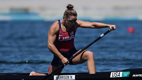 USA canoe athlete paddling during a sprint race.
