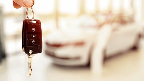 Car key held in hand