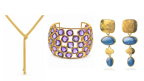 a lariat necklace, an amethyst cuff bracelet, and kyanite dangle earrings