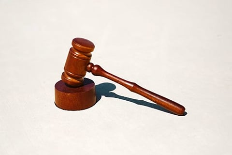 Wooden gavel on a block.