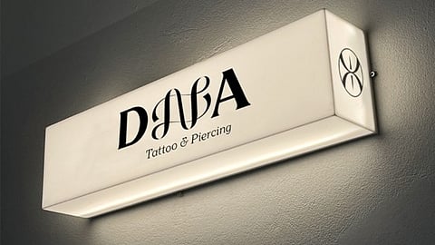 Illuminated DAVA Tattoo & Piercing sign.