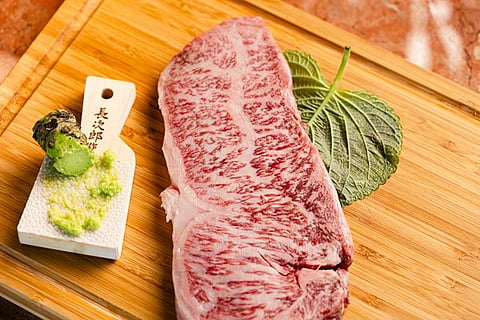 Sliced Wagyu steak plated at The Wagyu House in Hallandale Beach, Florida