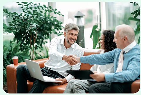 Business meeting handshake.