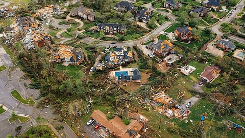 Aerial view of a tornado-damaged neighborhood.