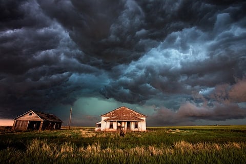 Stormy sky over houses.