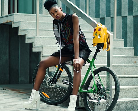 Victoria Beckham models a shopping bag in debut ad campaign