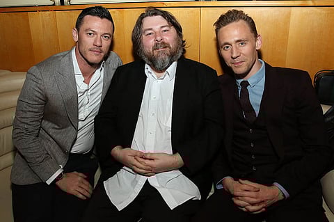 "NEW YORK, NY - APRIL 20: (L-R) Actor Luke Evans, director Ben Wheatley, and actor Tom Hiddleston attend the 2016 Tribeca Film Festival After Party For High-Rise Sponsored By EFFEN Vodka at Boom Boom Room on April 20, 2016 in New York City. (Photo by Monica Schipper/Getty Images for 2016 Tribeca Festival)"