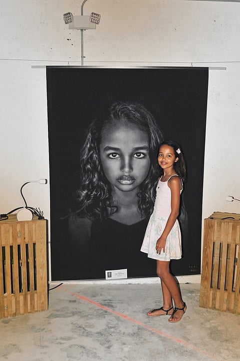 FACES OF THE WORLD GLOBAL PHOTO EXHIBIT