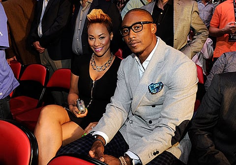 LAS VEGAS, NV - OCTOBER 12:  NFL player Brandon Marshall (R) and his wife, Michi Marshall, attend the Bradley vs. Marquez fight co-sponsored by the Wynn Las Vegas at the Thomas & Mack Center on October 12, 2013 in Las Vegas, Nevada.  (Photo by David Becker/WireImage)