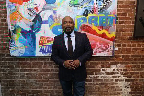 Artist Jojo Anavim and Daymond John at Anavim’s “Still Life (In My Head)” Art Exhibition Opening in New York City