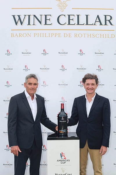 Sir Russell Coutts & Mr. Philippe Sereys de Rothschild in the Mouton Cadet Wine Cellar at the 35th America’s Cup, Bermuda