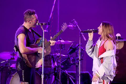 LOS ANGELES, CALIFORNIA - OCTOBER 23: Chris Martin of Coldplay and Melanie C perform onstage during the 8th annual "We Can Survive" concert hosted by Audacy at Hollywood Bowl on October 23, 2021 in Los Angeles, California. (Photo by Amy Sussman/Getty Images for Audacy)
