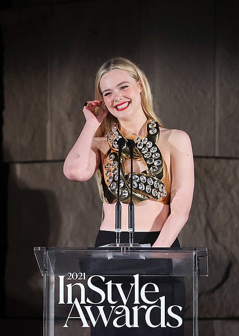 LOS ANGELES, CALIFORNIA - NOVEMBER 15: Elle Fanning speaks onstage during the 2021 InStyle Awards at The Getty Center on November 15, 2021 in Los Angeles, California. (Photo by Emma McIntyre/Getty Images for InStyle)