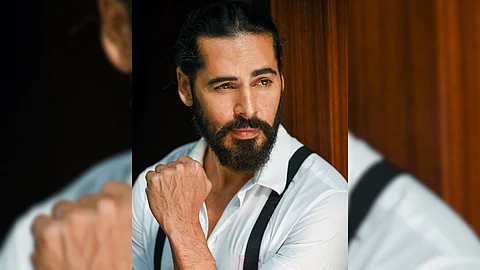 Dino Morea Searching Phone At Airport