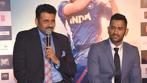 ms dhoni with arun pandey