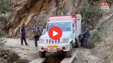 Villagers build pipe bridge to rescue vehicle
