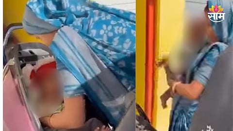 Viral video woman placing baby inside scooter dicky