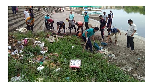 Seventy friends carried out a clean up operation on the banks of Indrayani river in Dehu