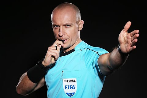 الحكم الدولي البولندي سيمون مارشينياك