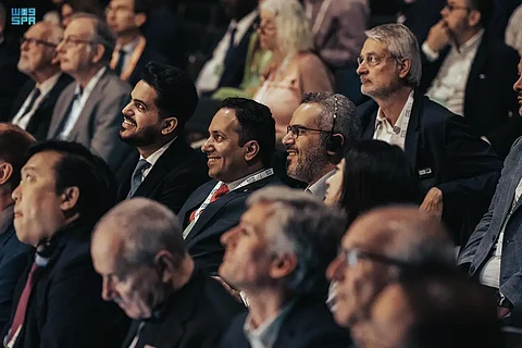 فواز السهلي وعبدالمجيد الطاسان خلال حضورهما قمة النقل العالمية ببرشلونة