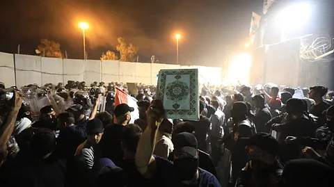 تبعات حرق المصحف بالدنمارك.. متظاهرون يحاولون اقتحام المنطقة الخضراء بالعراق