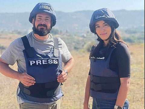 الصحفية فرح عمر والمصور ربيع المعماري