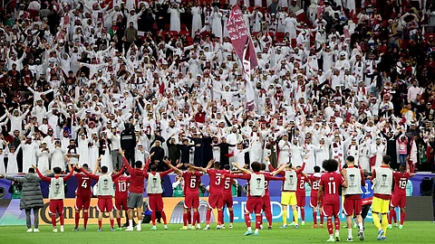 فرحة لاعبي منتخب قطر بالتأهل على حساب أوزبكستان