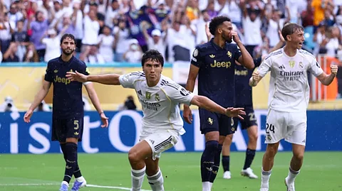 فرحة غارسيا لاعب ريال مدريد الإسباني بتسجيل هدف بمرمى يوفنتوس الإيطالي