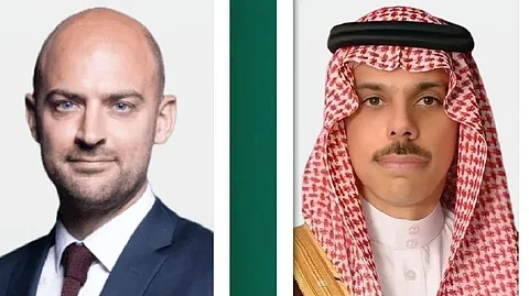 الأمير فيصل بن فرحان وجان نويل بارو