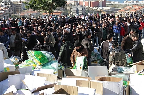 الحملة السعودية تواصل جهودها.. قدمت 21 ألف قطعة شتوية للسوريين في لبنان