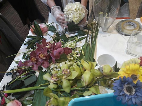 بالصور.. فتيات "التربية الاجتماعية" يشاركن في ورشة "أسرار منسقي الزهور"