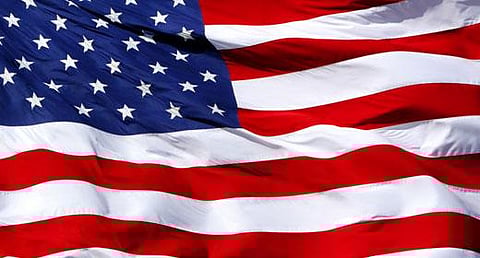 هذا هو سر الأعلام الأمريكية التي رُفعت وسط دمشق