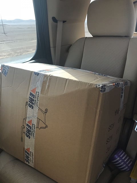 مدير بريد تبوك يسافر لتيماء لإيصال فستان زواج