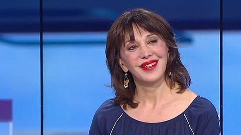 المترجمة الفورية لـ"شيراك وميتران": العربية لغة عالمية وفرنسا اعتمدتها قبل 431 عاماً